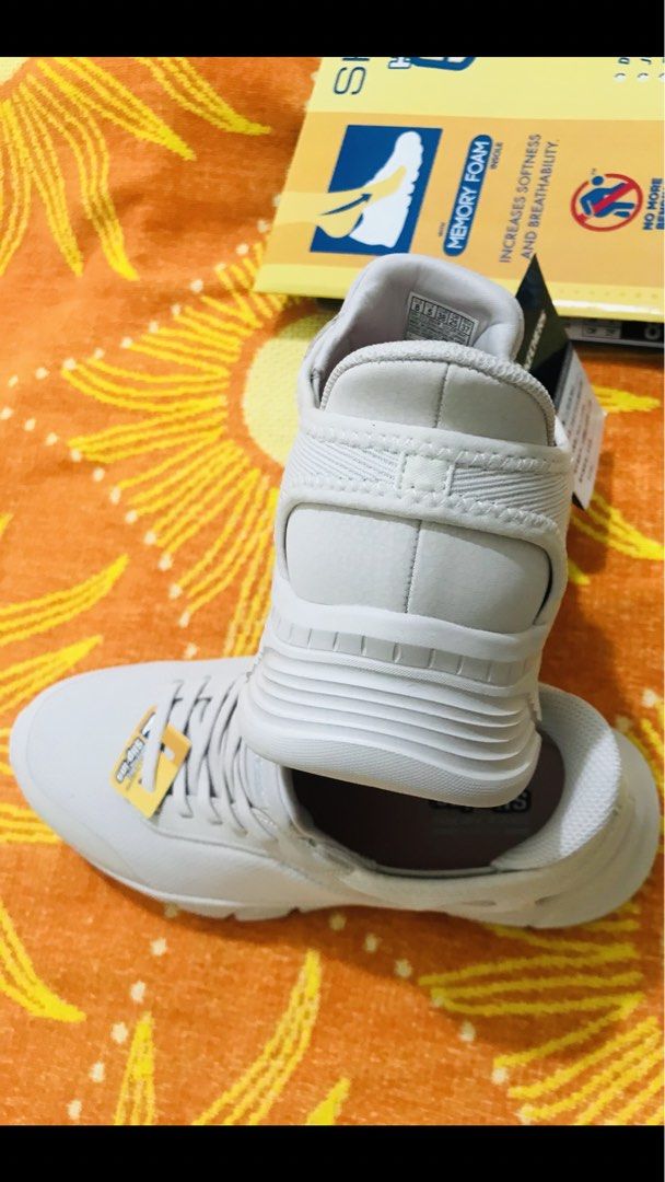 Skechers memory foam wide fit (Category: Sneakers) located in Manila. Submitted by freecat.21c0ee (Listing ID 1464578148, Image 2). Description: Original Skechers memory foam wide fit. Color White. very Comfy.