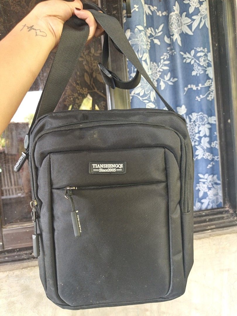 Sling bag for men (Category: Belt bags, Clutches and Pouches) located in Manila. Submitted by ukay-ukaybylyn (Listing ID 1464644767, Image 1). Description: bago pa need laba lang kasi may alikabok medium size na sya kasya long wallet at anik anik mo marami din zip pocket.