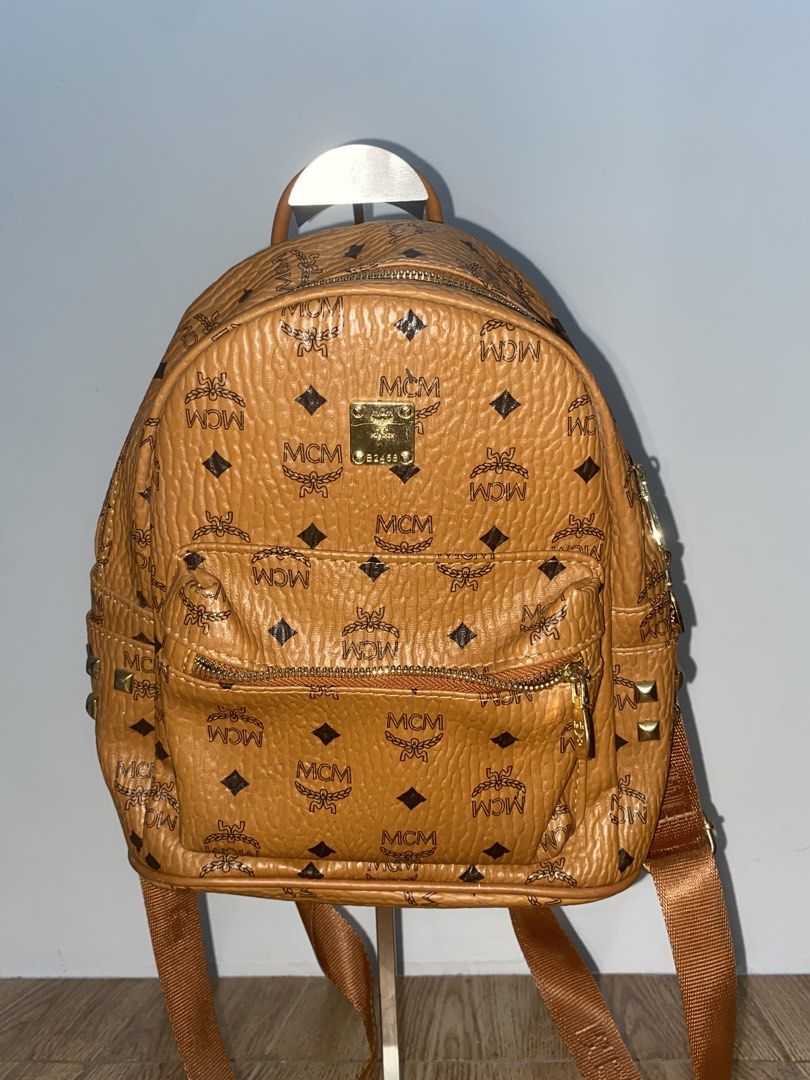 Small Backpack (Category: Luxury Bags & Wallets) located in Davao. Submitted by ccfinds_ph (Listing ID 1464697605, Image 1). Description: * Condition: Pre-loved daily wear on plate and canvas edges.