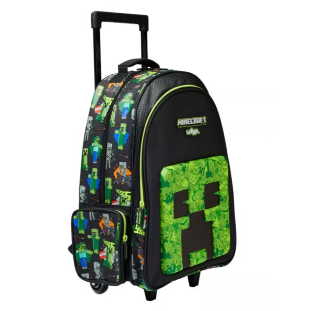 Smiggle Minecraft Trolley with light wheels (Category: Backpacks) located in Santiago. Submitted by evrythngulove (Listing ID 1464578413, Image 1). Description: - Official Smiggle rolling backpack - Features iconic Minecraft Creeper face on front pocket - All-over Minecraft character print on sides and front pouch - Built-in wheels with lights and retractable handle for easy carrying - Ideal for school, day trips, or travel - Your child will love