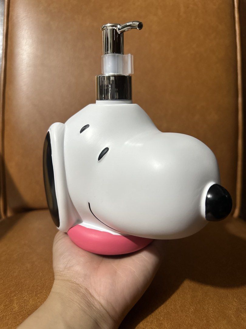 Snoopy Peanuts Soap Dispenser (Category: Character Goods) located in Quezon City. Submitted by oohsahanuhh (Listing ID 1464621136, Image 2). Description: Gcash payment Meet up Sm north edsa or trinoma Delivery: shpee chckout available - Adorable Snoopy head design - White dispenser with classic black ears and eyes - Features a cute pink collar detail - Durable chrome pump for easy dispensing - Ideal for adding a fun touch to your bathroom or kitc