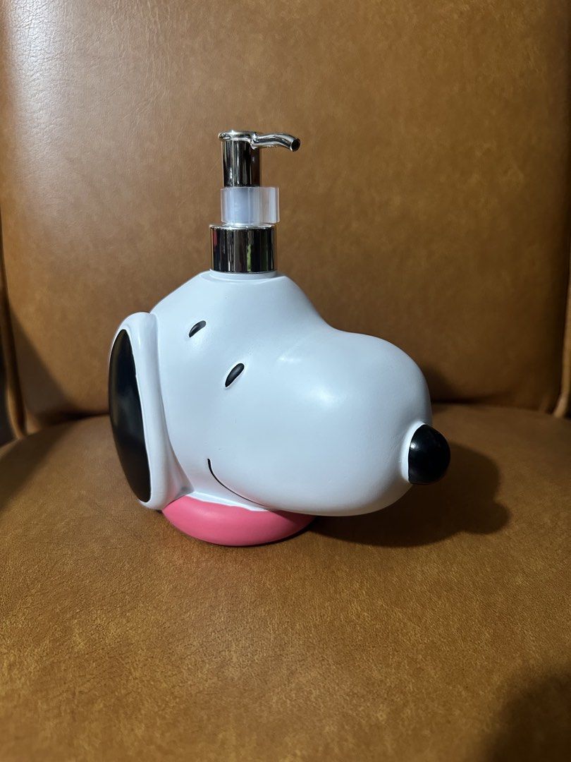 Snoopy Peanuts Soap Dispenser (Category: Character Goods) located in Quezon City. Submitted by oohsahanuhh (Listing ID 1464621136, Image 1). Description: Gcash payment Meet up Sm north edsa or trinoma Delivery: shpee chckout available - Adorable Snoopy head design - White dispenser with classic black ears and eyes - Features a cute pink collar detail - Durable chrome pump for easy dispensing - Ideal for adding a fun touch to your bathroom or kitc