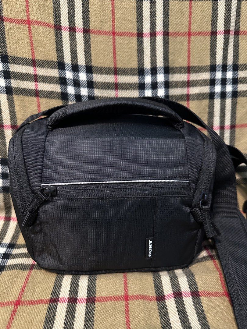 Sony Black Camera Shoulder Bag (Category: Camera Bags & Carriers) located in Subic. Submitted by stuffs_online (Listing ID 1464734001, Image 2). Description: SONY CAMERA BAG like new condition no flaws P480 add sf OLONGAPO LOC.