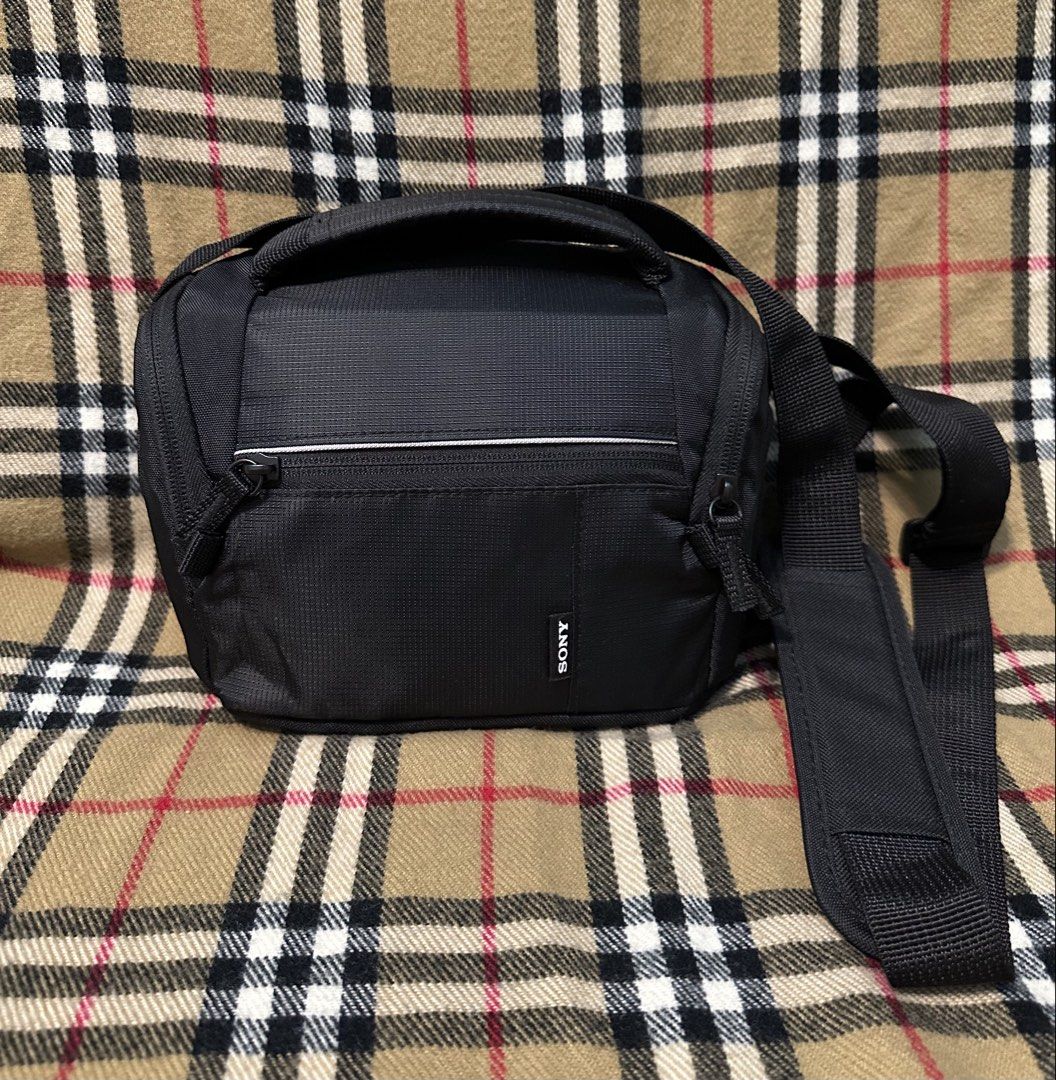 Sony Black Camera Shoulder Bag (Category: Camera Bags & Carriers) located in Subic. Submitted by stuffs_online (Listing ID 1464734001, Image 1). Description: SONY CAMERA BAG like new condition no flaws P480 add sf OLONGAPO LOC.