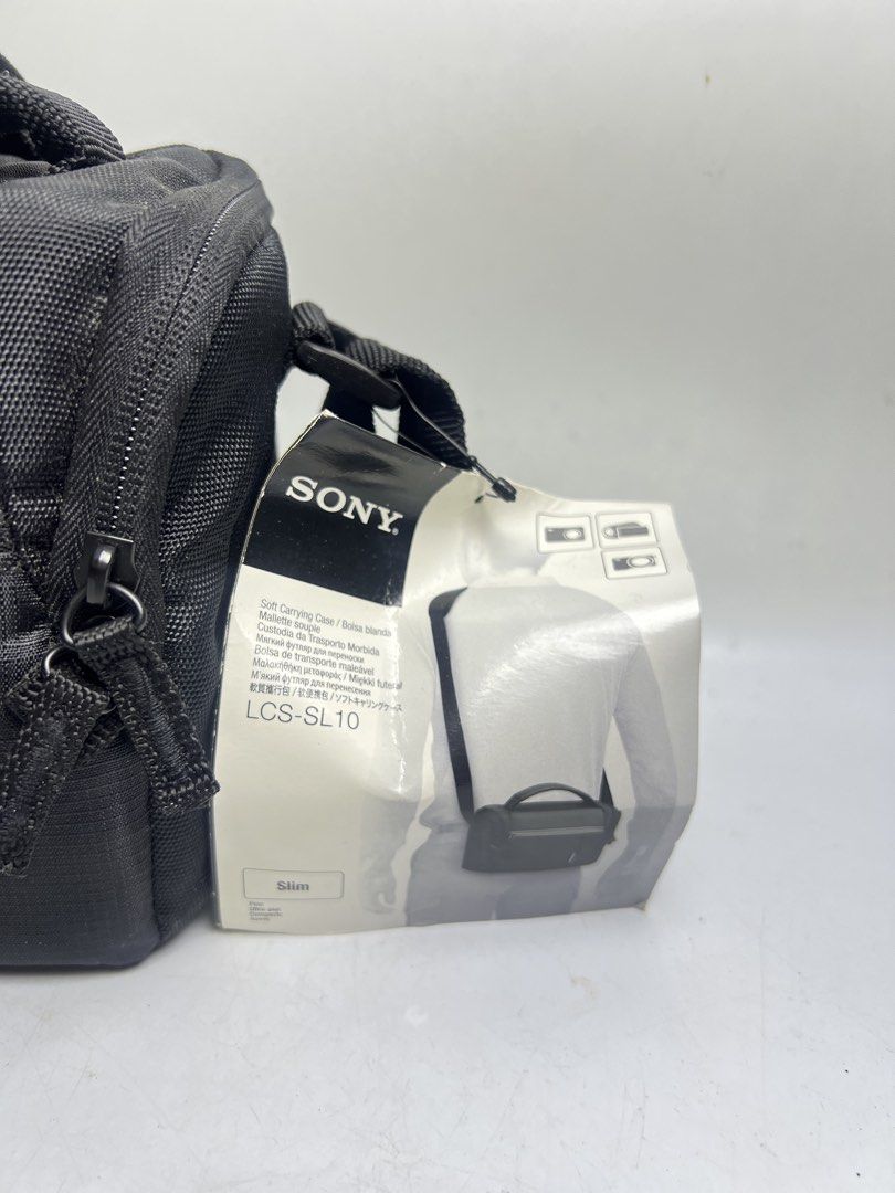 Sony LCS-SL10 Soft Carrying Case (Category: Camera Bags & Carriers) located in Baguio. Submitted by chiechie1234 (Listing ID 1464716396, Image 2). Description: - Authentic Sony LCS-SL10 soft camera case (Black) - Slim shoulder bag design with included strap - Customizable main compartment with adjustable padded dividers - Convenient front zipped pocket for accessories and spare batteries - Handy mesh pocket under the top lid - Durable exterior ma