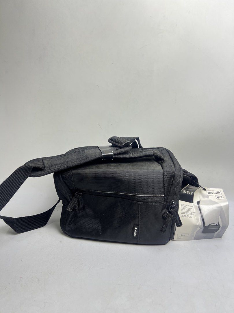 Sony LCS-SL10 Soft Carrying Case (Category: Camera Bags & Carriers) located in Baguio. Submitted by chiechie1234 (Listing ID 1464716396, Image 1). Description: - Authentic Sony LCS-SL10 soft camera case (Black) - Slim shoulder bag design with included strap - Customizable main compartment with adjustable padded dividers - Convenient front zipped pocket for accessories and spare batteries - Handy mesh pocket under the top lid - Durable exterior ma