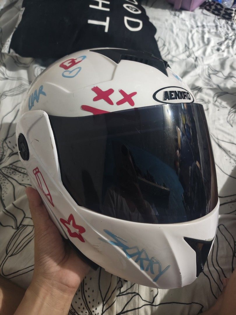 Spare Modular Helmet (Category: Helmets and other Riding Gears) located in Manila. Submitted by miharu.jxx (Listing ID 1464719409, Image 1). Description: Aenxao Modular Helmet – ₱700 (Negotiable) > Bought Feb 2025, original price ₱1,168. > ✅ Dual visor modular design > ✅ ICC sticker (if still intact) > ⚠️ Issues: Scratches, paint wear, foam partly loose (ok for casual use, not ideal for strict safety). > Perfect for short rides or spare helmet. >