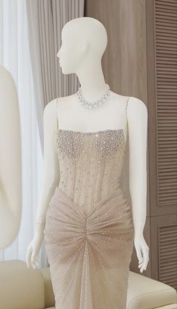 Sparkly Strapless Gown (Category: Evening dresses & gowns) located in Quezon City. Submitted by andrealois. (Listing ID 1464683644, Image 1). Description: - Elegant floor-length gown - Features a sparkly, sheer overlay - Intricate beading on the bodice - Corset-style fit for a flattering silhouette - Ruched detail at the front of the skirt - Ideal for formal events, parties, or special occasions - Guaranteed to make you look amazing!.