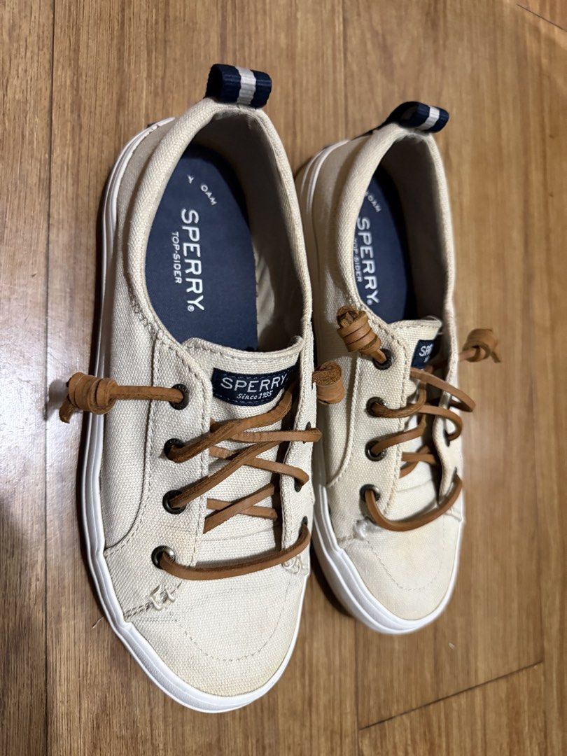 Sperry Top-Sider Canvas Sneakers Cream (Category: Sneakers) located in Mandaluyong City. Submitted by unique_100_findsph (Listing ID 1464690792, Image 1). Description: - Brand/Model: Sperry Cream Canvas Slip-On Sneakers - Color: Cream canvas with brown leather knotted laces - Comfort: Memory Foam insoles for all-day wear - Details: Striped pull tabs at the heel - Used only twice - Style: Relaxed, casual, and perfect for everyday use.