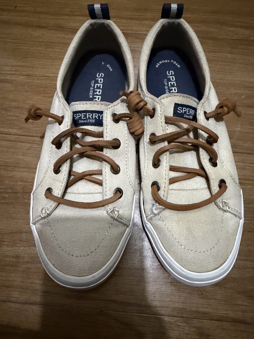 Sperry Top-Sider Canvas Sneakers Cream (Category: Sneakers) located in Mandaluyong City. Submitted by unique_100_findsph (Listing ID 1464690792, Image 2). Description: - Brand/Model: Sperry Cream Canvas Slip-On Sneakers - Color: Cream canvas with brown leather knotted laces - Comfort: Memory Foam insoles for all-day wear - Details: Striped pull tabs at the heel - Used only twice - Style: Relaxed, casual, and perfect for everyday use.