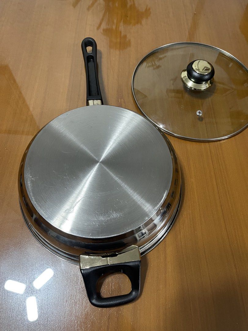 Stainless Steel Saute Pan 24cm (Category: Cookware & Accessories) located in Quezon City. Submitted by doublelkitchenware (Listing ID 1464745193, Image 2). Description: Stainless Steel Saute Pan No brand 24x6.5cm Induction / Gas / Electric Makapal and mabigat Like new, with minimal dent Pick up or shipping via lalamove Provincial 🚚j&t Novaliches Qc .
