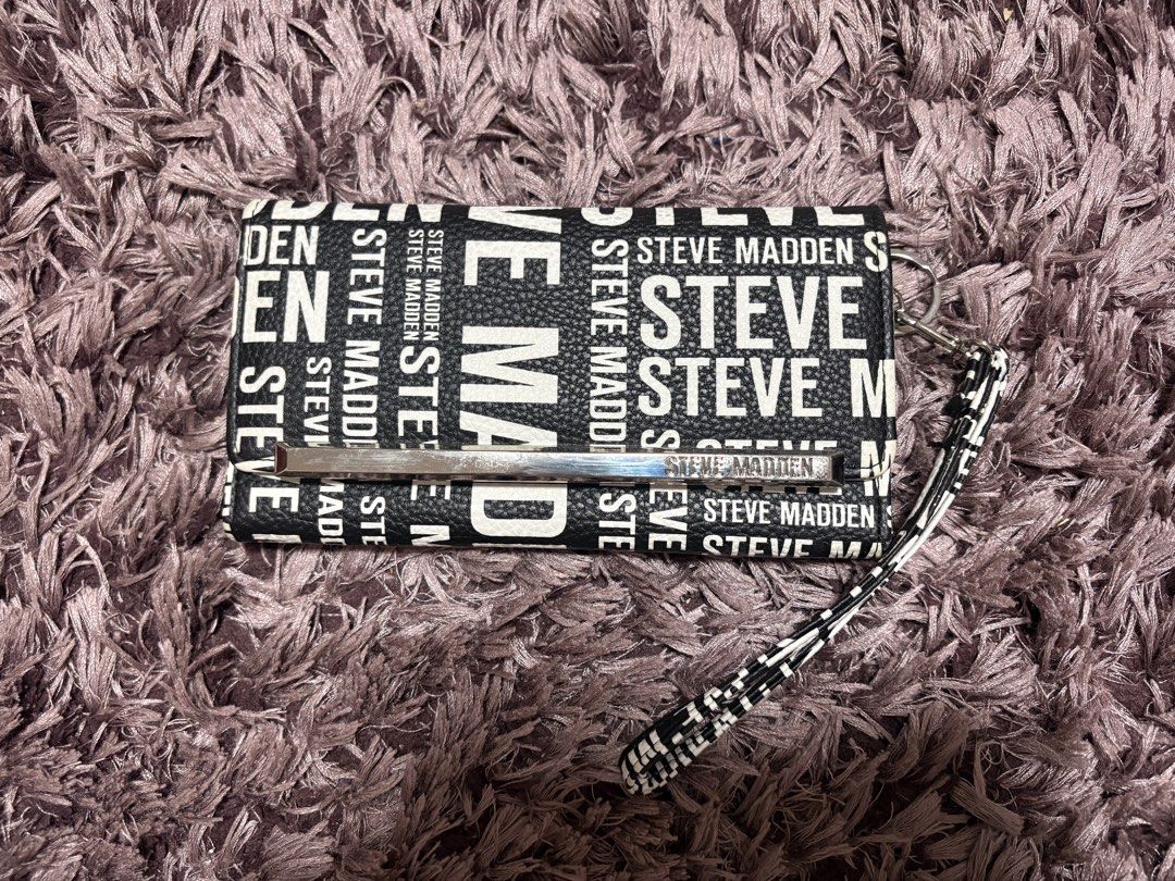 Steve Madden LOGOBAR TRIFOLD Wallet Wristlet (WHT/MULT) (Category: Wallets & Card holders) located in Quezon City. Submitted by jjccly (Listing ID 1464655452, Image 1). Description: brand new condi never used got as a gift from the US last year no flaws/issues og price is $45!! .