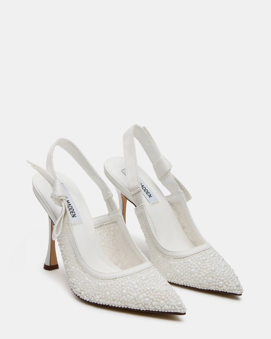 Steve Madden White Pearl Slingback Heels (Category: Heels) located in Imus. Submitted by heypeya (Listing ID 1464634309, Image 1). Description: White slingback heels adorned with pearls Used once for Wedding Ceremony and pictures only..