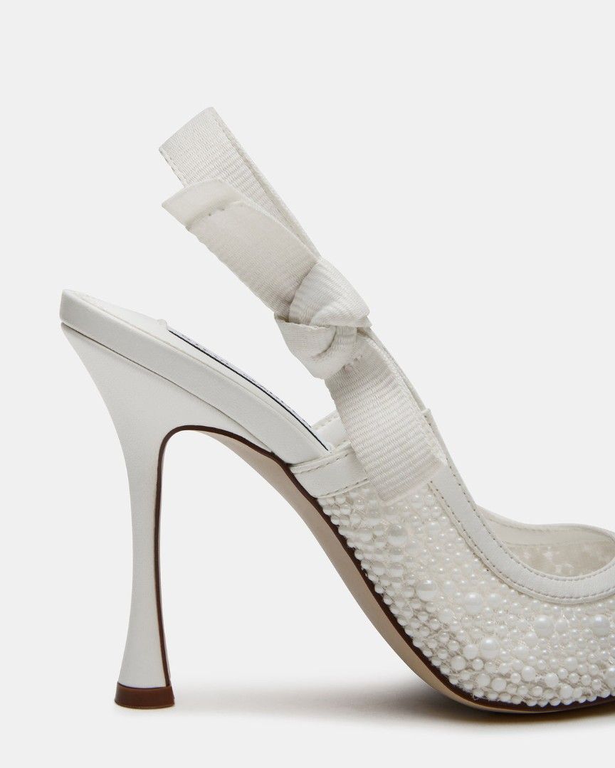 Steve Madden White Pearl Slingback Heels (Category: Heels) located in Imus. Submitted by heypeya (Listing ID 1464634309, Image 2). Description: White slingback heels adorned with pearls Used once for Wedding Ceremony and pictures only..