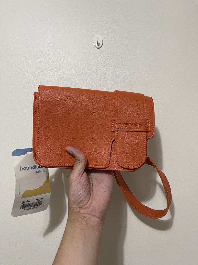 Straightforward Boundless Basics Orange Sling Bag (Category: Cross-body Bags) located in Pasig City. Submitted by gespinosa (Listing ID 1464737287, Image 1). Description: - Brand: Straightforward (Boundless Basics) - Color: Vibrant Orange - Condition: Brand new with original tags attached - Features: Structured flap design, strap loops on the back, clean interior - Inclusion: Adjustable strap included - Perfect for daily use and adding a pop of c