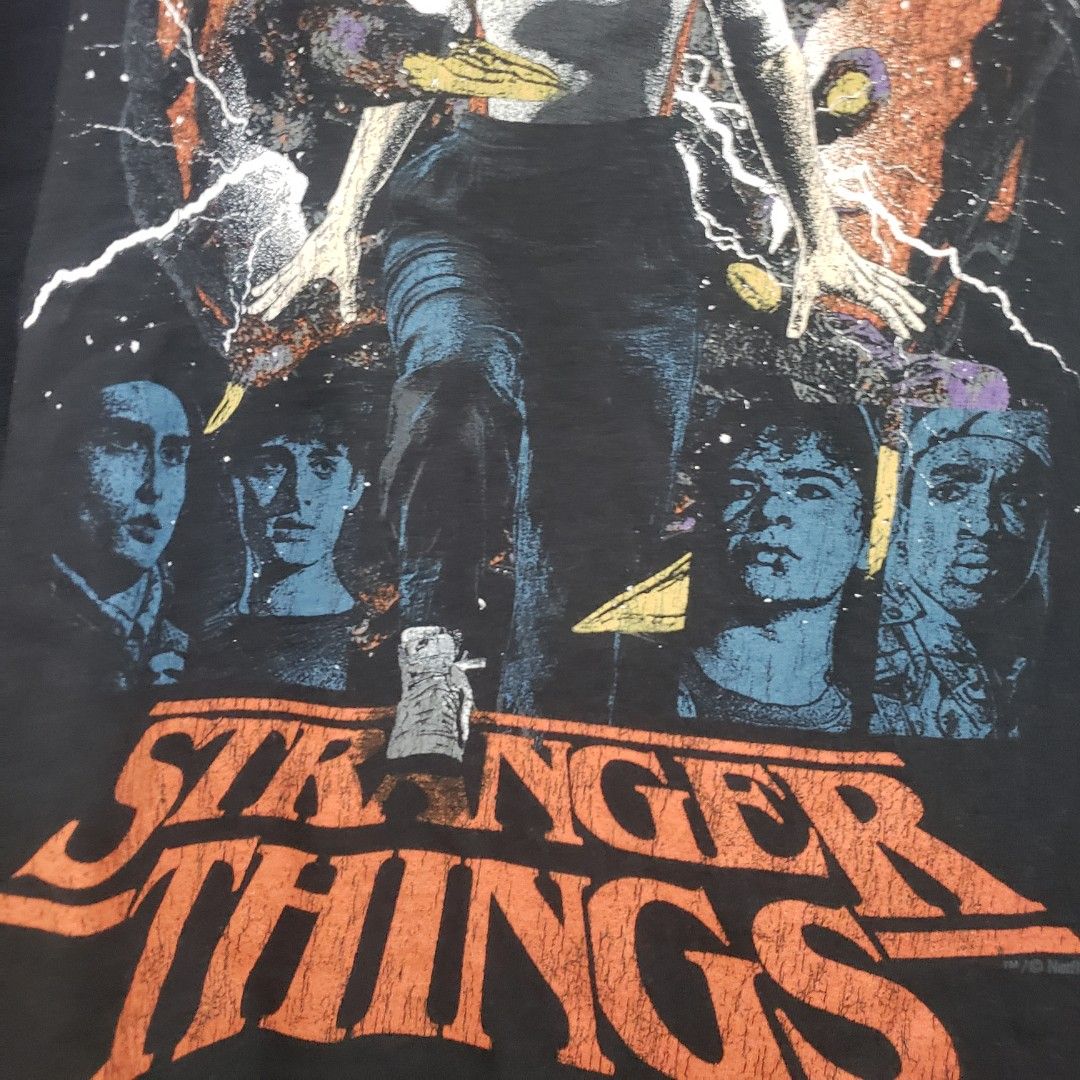 Stranger Things (Category: Tshirts & Polo Shirts ) located in Manila. Submitted by sourmustsour (Listing ID 1464584948, Image 3). Description: Tag: Gildan black 21x28 Hairlines.