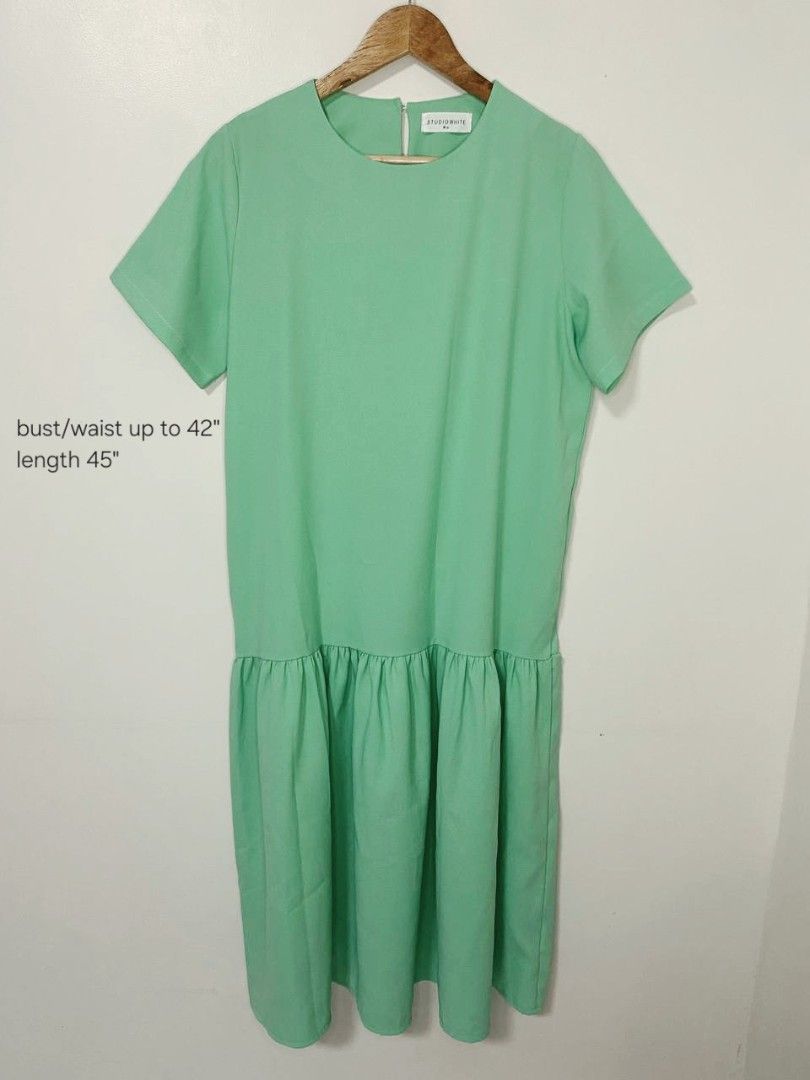 Studio White Mint Green Drop Waist Dress (Category: Dresses) located in Laoag. Submitted by __baptistakim (Listing ID 1464709760, Image 1). Description: Mint green midi dress from Studio White. Short sleeves, round neckline, drop waist with pleated skirt detail. Back button closure at the neck. Bust and waist fit up to 42 inches. Total length is 45 inches..