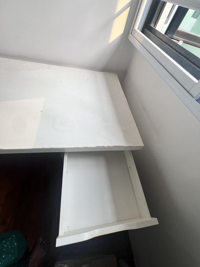 Study/work table (Category: Tables & Sets) located in Singapore. Submitted by abr143 (Listing ID 1464578972, Image 2). Description: white study or work table , lighlty used in good condition, light weight and has racks for storage.