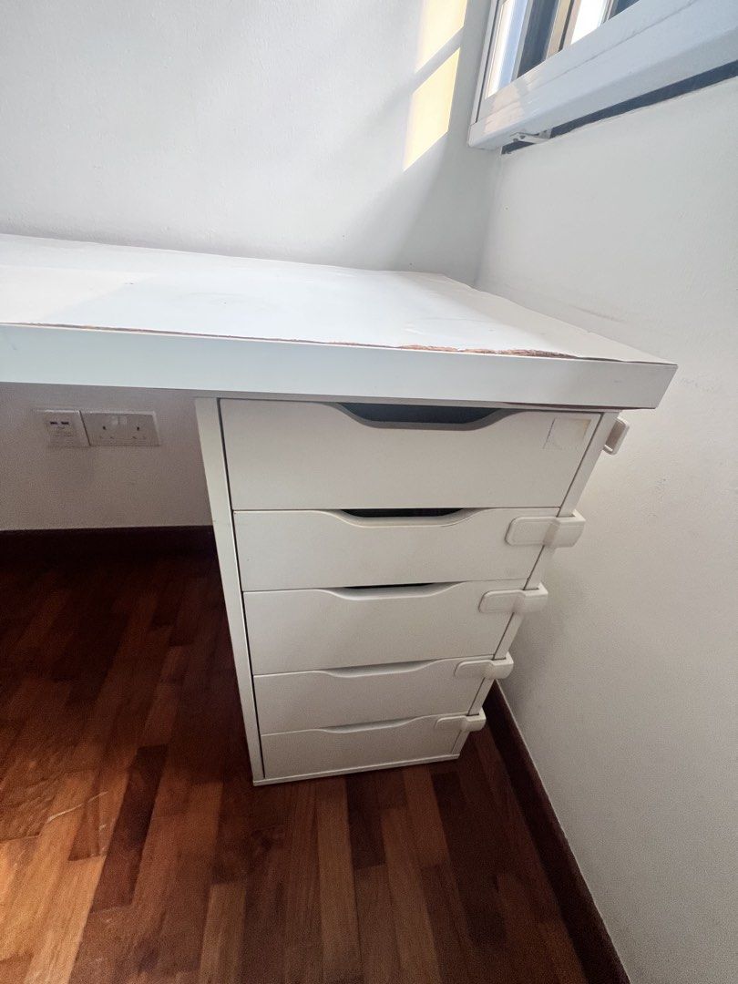 Study/work table (Category: Tables & Sets) located in Singapore. Submitted by abr143 (Listing ID 1464578972, Image 3). Description: white study or work table , lighlty used in good condition, light weight and has racks for storage.