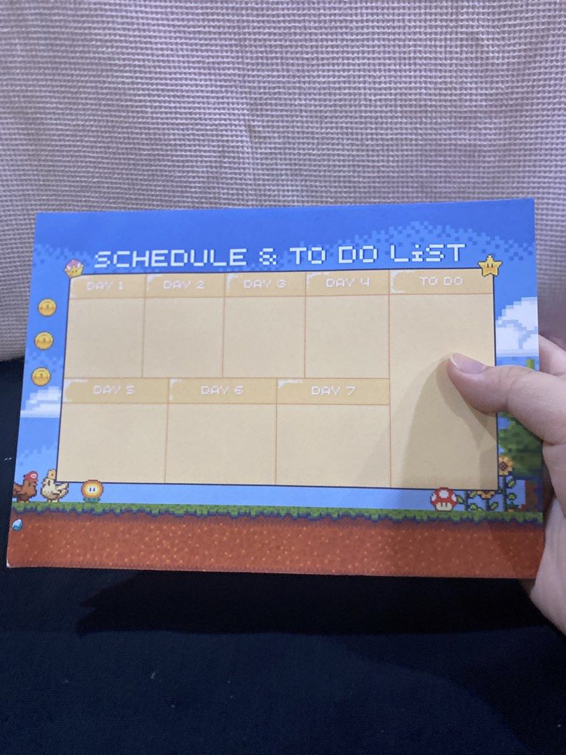 Super Mario Themed Schedule & To Do List Notepad (Category: Stationery & School Supplies) located in Manila. Submitted by shudashi (Listing ID 1464657477, Image 3). Description: - Fun Super Mario-inspired design - Weekly planner format with days 1-7 - Includes a dedicated to-do list section - Ideal for students, gamers, or anyone who loves organization - Plain cardboard backing - Helps you track tasks and appointments.