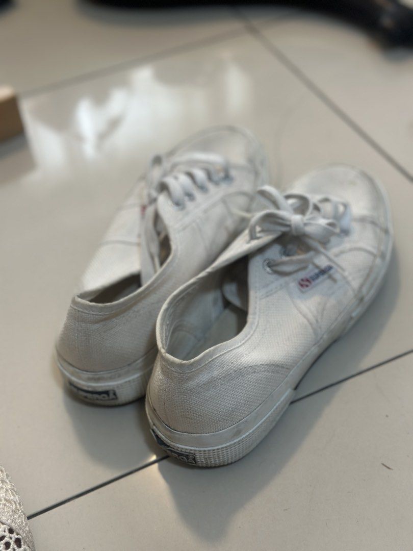 Superga White Canvas Sneakers (Category: Sneakers) located in Pasig City. Submitted by xoaeshaox (Listing ID 1464615469, Image 1). Description: - Classic white canvas sneakers from Superga. - Lace-up style for a secure fit. - Versatile pair, ideal for everyday casual outfits. - Shows expected signs of wear, but plenty of life left..