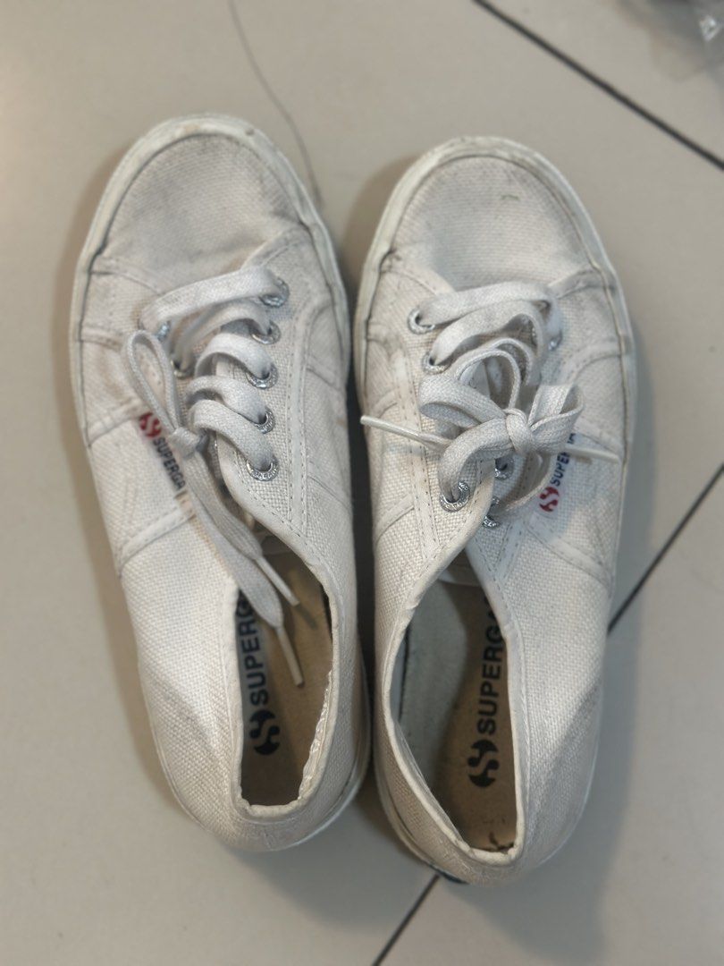 Superga White Canvas Sneakers (Category: Sneakers) located in Pasig City. Submitted by xoaeshaox (Listing ID 1464615469, Image 2). Description: - Classic white canvas sneakers from Superga. - Lace-up style for a secure fit. - Versatile pair, ideal for everyday casual outfits. - Shows expected signs of wear, but plenty of life left..