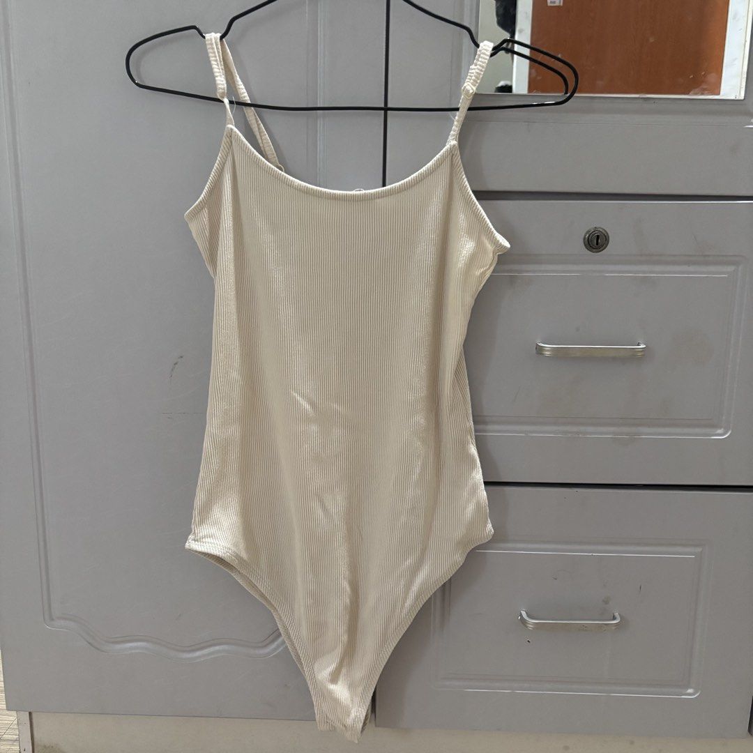 Supre Ribbed Cream Bodysuit Top (Category: Sleeveless) located in Binan City. Submitted by mypreloved_haul (Listing ID 1464587629, Image 1). Description: LAST PRICE POSTED! FOR SURE BUYERS ONLY..