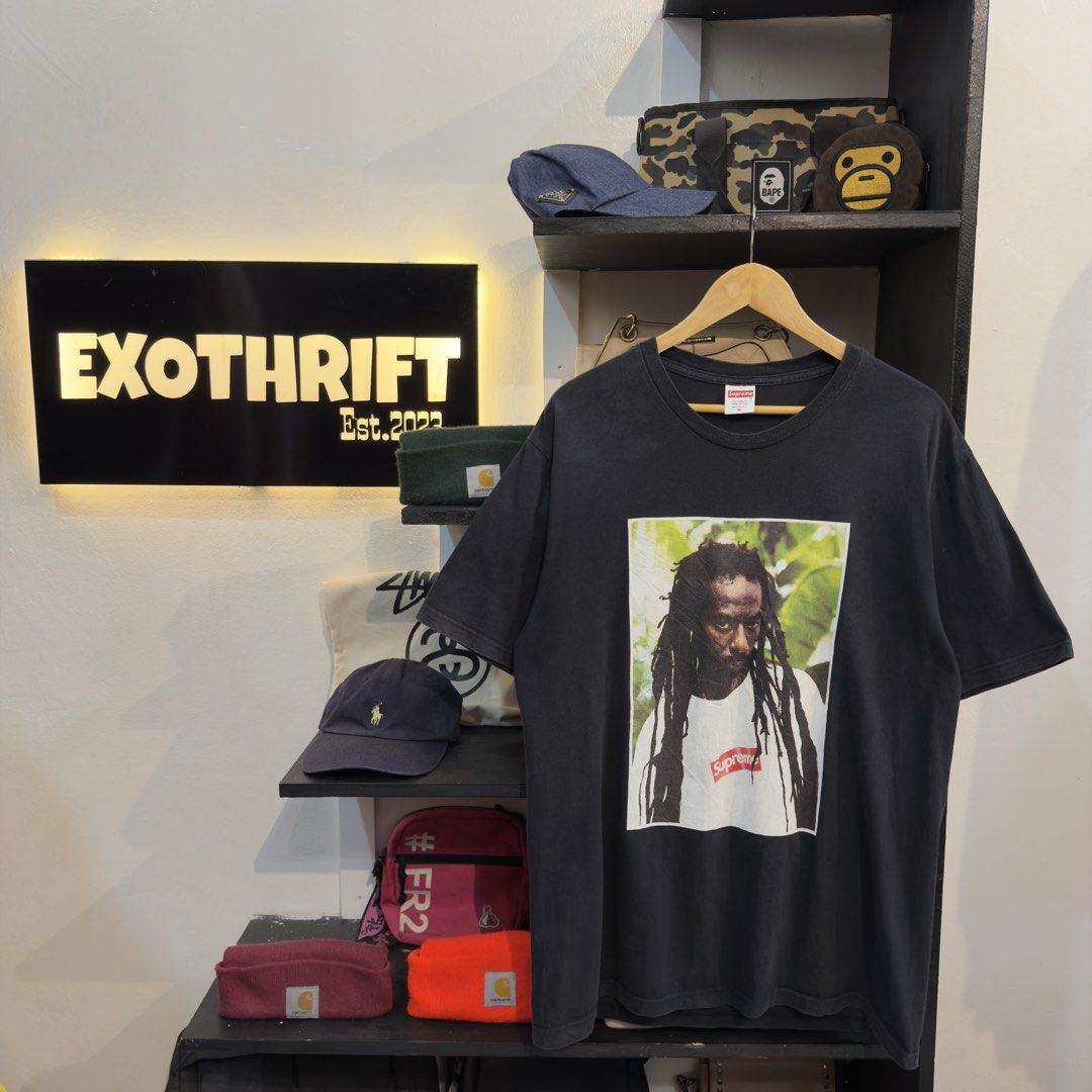 Supreme Buju Banton Tee (Category: Tshirts & Polo Shirts ) located in Manila. Submitted by jerichomal82553 (Listing ID 1464746127, Image 1). Description: Supreme Buju Banton Tee 21.5 by 30 Good Condition Complete Tags CLAIM 1500.