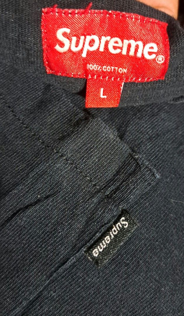 Supreme Pocket Tee Black Size L (Category: Tshirts & Polo Shirts ) located in San Fernando, Camarines Sur. Submitted by ladderaya (Listing ID 1464695490, Image 3). Description: - Item: Supreme Pocket Tee - Color: Black - Size: Large (Tag attached at neck) - Details: Small woven Supreme box logo on left chest pocket, classic crewneck fit - Material: 100% cotton with inner wash care tag - Measurements: Length 30" / Width 22.5" (Refer to first photo