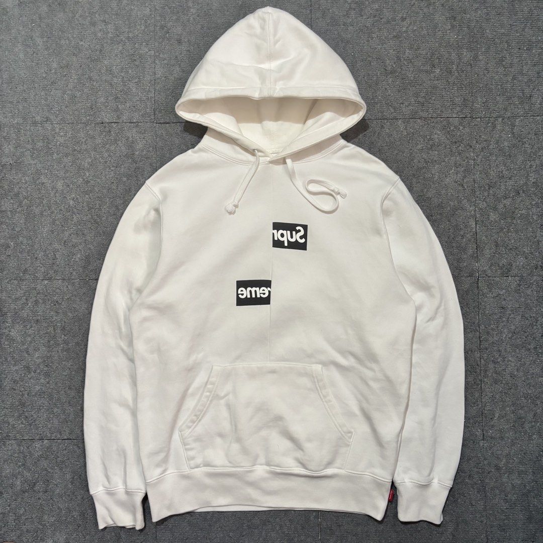 Supreme x Comme des Garcons Split Box Logo Hoodie (Category: Hoodies) located in Cavite. Submitted by gemsouttanowhere (Listing ID 1464614592, Image 1). Description: Small fits Medium-Large 22x27 Minor dot yellow stains.