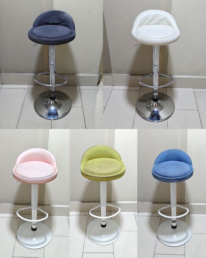 Swivel Bar Stool (Category: Chairs) located in Taguig. Submitted by shathree (Listing ID 1464711214, Image 1). Description: NOTE: for Metro Manila pick up only!! Cannot ship as this is too big 🥹🙏🏻 Hello! Decluttering / selling our bar stools😊 - a bit old but still very usable - the 2 metal ones has some specs of rust but can be cleaned some more - white & pink chairs - leather - gray/blue/green chairs- fabric cotton (stained but cleaned; we a