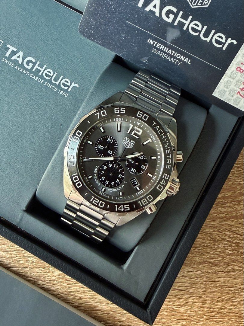 Tag Heuer Formula 1 Chronograph Black Ceramic (Category: Men's Watches) located in Pasig City. Submitted by migspaggabao (Listing ID 1464592922, Image 1). Description: Tag Heuer Formula 1 Chronograph Black Ceramic Bezel Black Sunray Brushes Dial Ref. No. CAZ1011.BA0842 Swiss Quartz Chronograph Movement 43 mm case 9.5/10 condition. Dated yr 2019. Local AD purchase. Selling below current model SRP PHP 184k! Inclusions: watch, double box, manual, gu