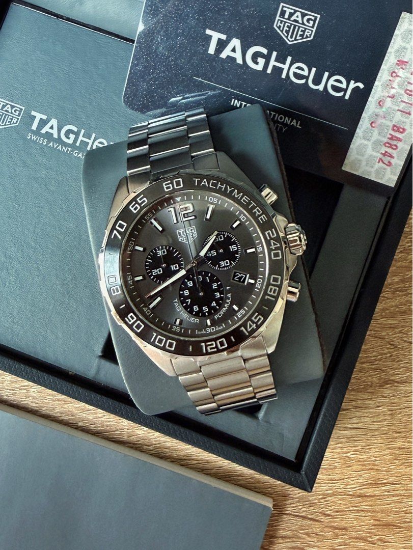Tag Heuer Formula 1 Chronograph Black Ceramic (Category: Men's Watches) located in Pasig City. Submitted by migspaggabao (Listing ID 1464592922, Image 2). Description: Tag Heuer Formula 1 Chronograph Black Ceramic Bezel Black Sunray Brushes Dial Ref. No. CAZ1011.BA0842 Swiss Quartz Chronograph Movement 43 mm case 9.5/10 condition. Dated yr 2019. Local AD purchase. Selling below current model SRP PHP 184k! Inclusions: watch, double box, manual, gu
