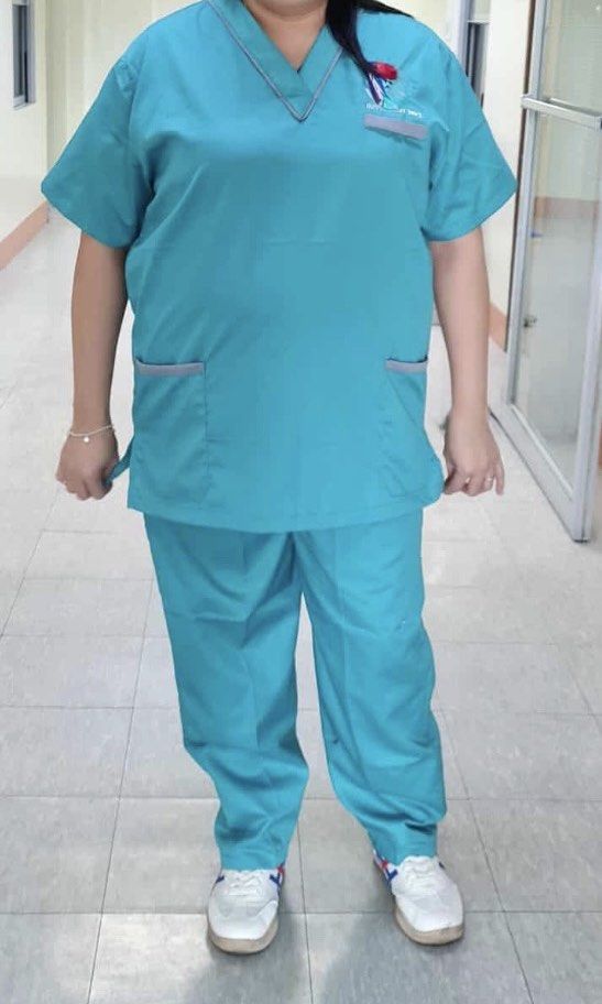 Teal Scrub Suit Top and Pants Set (Category: Sets or Coordinates) located in Cavite. Submitted by momskiette (Listing ID 1464635486, Image 2). Description: - Teal scrub suit set Brand New - V-neck top with chest pocket - Top features two front pockets - Matching pants with multiple cargo pockets - Comfortable and practical for work - Ideal for medical professionals and durable workwear needs Available Size on hand for cargo pants =2 sets and for 
