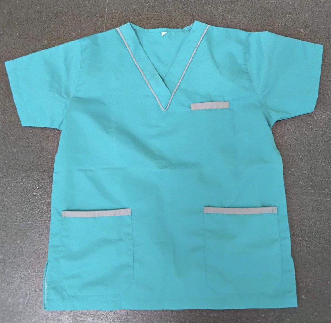 Teal Scrub Suit Top and Pants Set (Category: Sets or Coordinates) located in Cavite. Submitted by momskiette (Listing ID 1464635486, Image 1). Description: - Teal scrub suit set Brand New - V-neck top with chest pocket - Top features two front pockets - Matching pants with multiple cargo pockets - Comfortable and practical for work - Ideal for medical professionals and durable workwear needs Available Size on hand for cargo pants =2 sets and for 