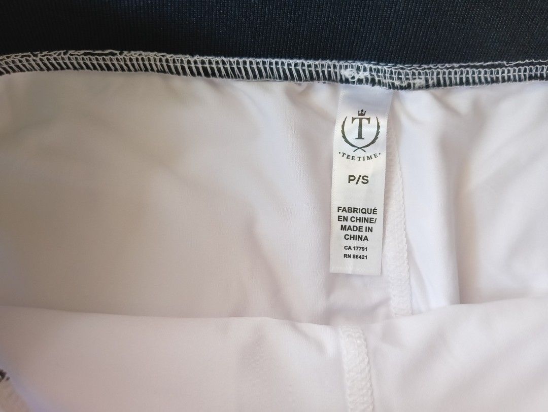 Tee Time Skirts (Category: Activewear) located in Rizal. Submitted by timeless_shop (Listing ID 1464610081, Image 2). Description: 🔥 ORIGINAL Tee Time White Tennis Skort 📏 Width: 15 inches lay flat - 30 inches paikot kasya 29-30 bewang 📏 Length: 16 inches 👗 Size: P/S on tag pero kasya S-M - stretchy! 🎨 Color: White with black waistband + 2 white stripes ✂️ Style: Tennis Skort with built-in shorts sa loob + side pockets 💯 Condition: 10/10 Go