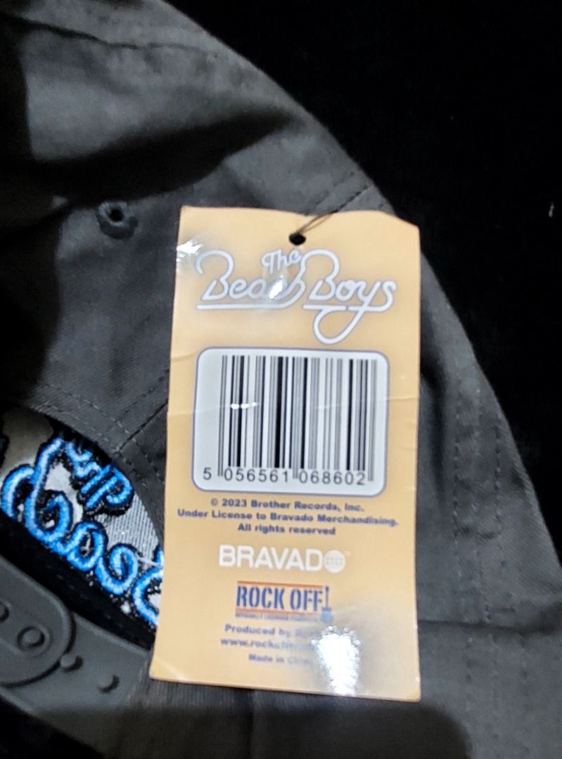 The Beach Boys - Official Licensed Snapback Cap Hat '61 (Category: Caps & Hats) located in Legazpi City. Submitted by street_uniform (Listing ID 1464741936, Image 3). Description: - Brand: The Beach Boys (Officially licensed Rock Off) - Condition: Brand new with original paper hang tag - Color: Grey and black - Design: Large blue embroidered band logo on front with orange '61 embroidery on the side - Closure: Adjustable snapback ISSUE: SEE LAST P