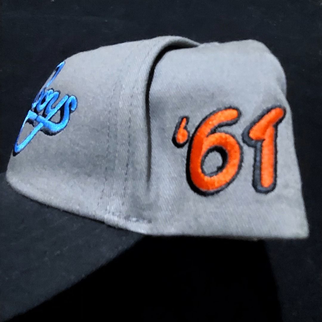 The Beach Boys - Official Licensed Snapback Cap Hat '61 (Category: Caps & Hats) located in Legazpi City. Submitted by street_uniform (Listing ID 1464741936, Image 2). Description: - Brand: The Beach Boys (Officially licensed Rock Off) - Condition: Brand new with original paper hang tag - Color: Grey and black - Design: Large blue embroidered band logo on front with orange '61 embroidery on the side - Closure: Adjustable snapback ISSUE: SEE LAST P