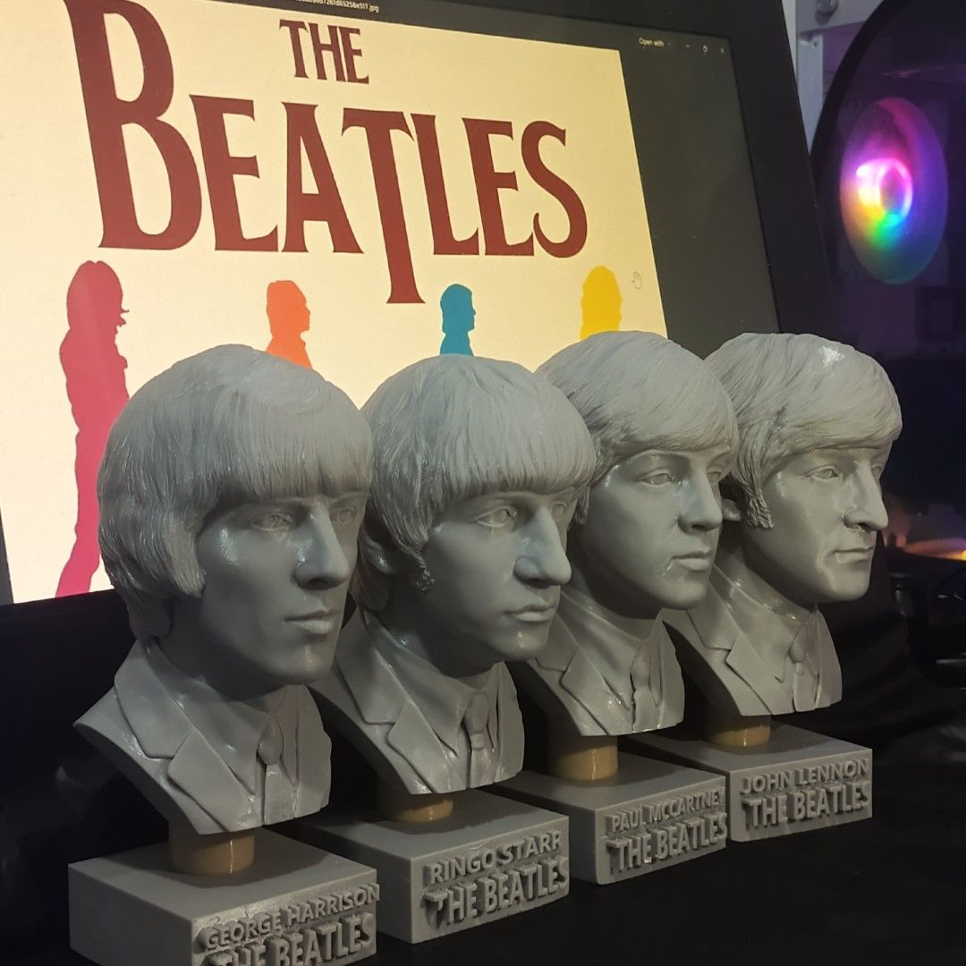 The Beatles Bust Statues John Paul George Ringo (Category: Figurines & Statues) located in Cavite. Submitted by trixacijem08326 (Listing ID 1464740054, Image 1). Description: - Complete set of 4 The Beatles busts featuring John Lennon, Paul McCartney, George Harrison, and Ringo Starr - Crafted from solid grey resin with detailed facial features and classic mop-top hairstyles - Each figure mounted on a sleek grey base with engraved name and band t