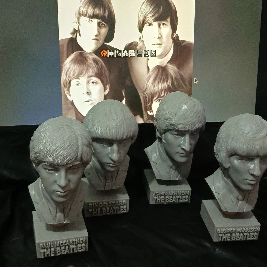The Beatles Bust Statues John Paul George Ringo (Category: Figurines & Statues) located in Cavite. Submitted by trixacijem08326 (Listing ID 1464740054, Image 3). Description: - Complete set of 4 The Beatles busts featuring John Lennon, Paul McCartney, George Harrison, and Ringo Starr - Crafted from solid grey resin with detailed facial features and classic mop-top hairstyles - Each figure mounted on a sleek grey base with engraved name and band t
