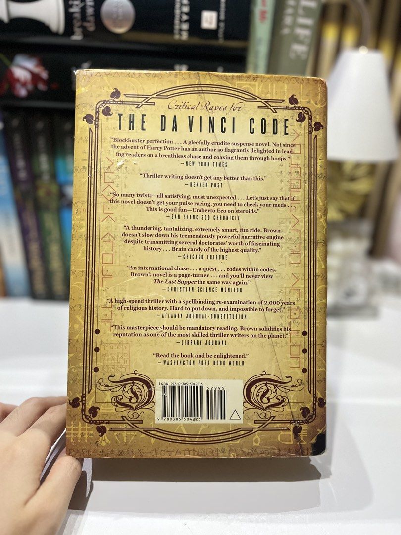 The Lost Symbol – Dan Brown (Category: Storybooks) located in Manila. Submitted by sophie.navs (Listing ID 1464726365, Image 2). Description: The Lost Symbol – Dan Brown Bought it originally for ₱1k before Format: Authentic Hardbound / Hardcover (with Dust Jacket) ‼️ Condition: Heavily Damaged due to storage / Reading Copy ‼️ Details: Outer dust jacket, board edges, and page block show visible foxing, aging, and storage wear Hardcover structure, 