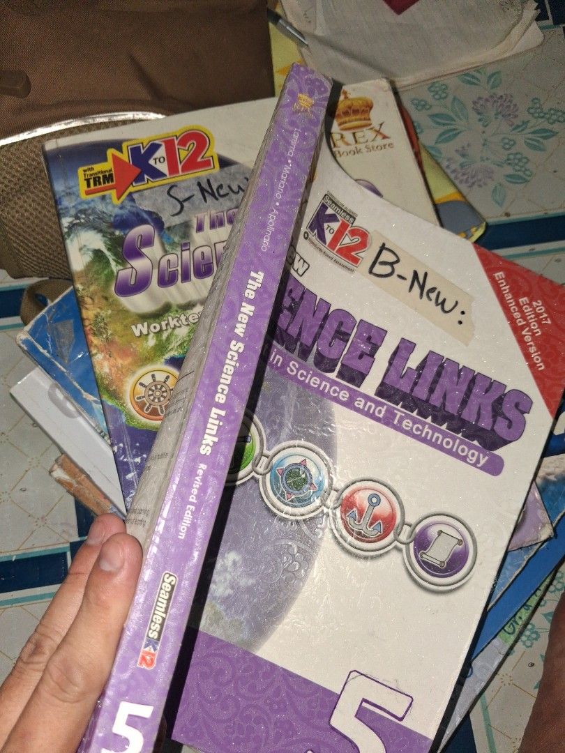 The New Science Links K12 Worktext Grade 5 Revised Edition (Category: Textbooks) located in Manila. Submitted by marcas022798212 (Listing ID 1464682412, Image 2). Description: - The New Science Links K12 Worktext in Science and Technology - Grade 5, Revised Edition (2017) - Covers key topics: Human Reproductive System, Force and Motion, Light, Sound, and Heat - Published by REX Book Store - Ideal for Grade 5 students.