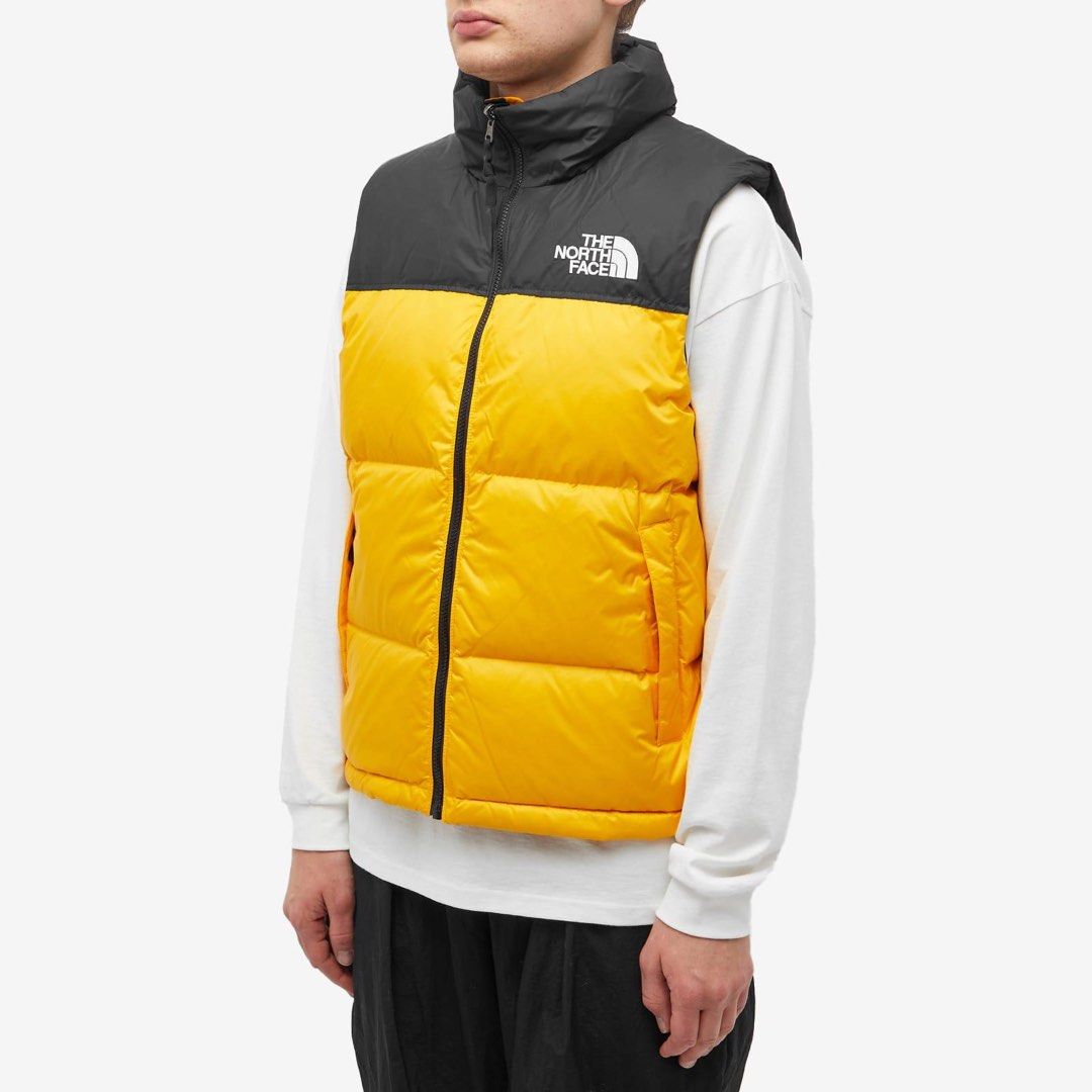 THE NORTH FACE - BLACK/YELLOW PUFFER VEST (Category: Vests) located in Lucena. Submitted by southsidekartell (Listing ID 1464689972, Image 1). Description: SMALL IN GOOD CONDITION ISSUE STAINS .