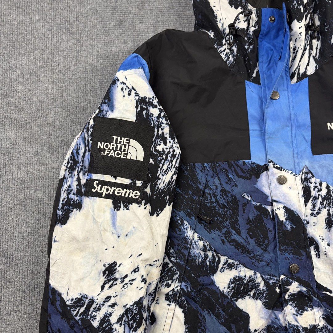 The North Face x Supreme Mountain Parka (Category: Coats, Jackets and Outerwear) located in Manila. Submitted by yourtherapist_ (Listing ID 1464706876, Image 3). Description: The North Face x Supreme Mountain Parka Size: S Condition: Excellent Flaw: Light stains Made in: Vietnam Measurements Width: 22 Length: 27 Shoulder: 19 Sleeve: 25 4,000.