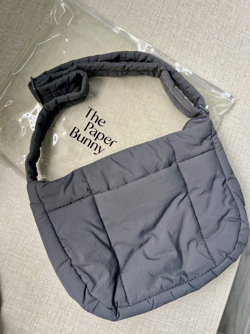 THE PAPER BUNNY PUFFER SWING (SHADOW) (Category: Cross-body Bags) located in Quezon City. Submitted by fromkimwithless (Listing ID 1464733874, Image 2). Description: - Color: Shadow (dark grey) - Includes: ziplock bag - Purchased: SG/2025.