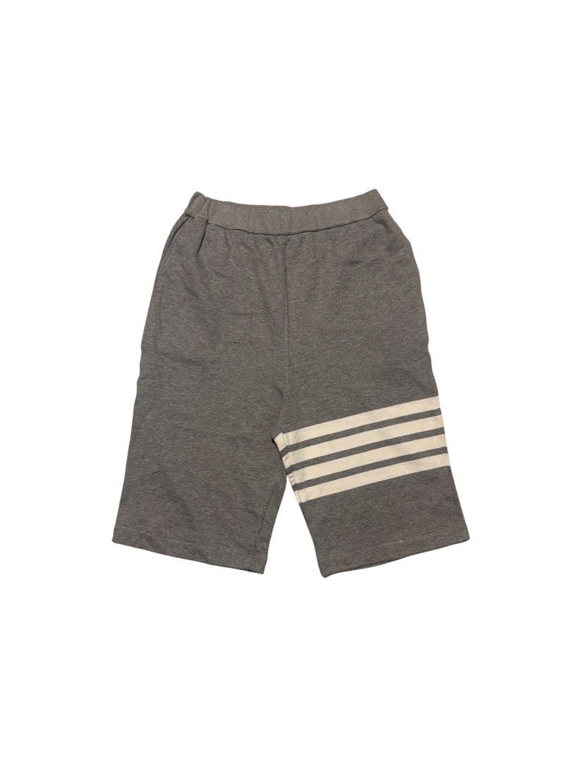 Thom Browne Classic Loopback 4-Bar Sweat Shorts (Category: Luxury Apparel) located in Cagayan de Oro. Submitted by thatsdopethrift (Listing ID 1464696667, Image 1). Description: elasticated waistband and signature tricolor Oxford lining on the interior tags. Excellent pre-owned condition with crisp lettering and intact labels. Great for luxury casual wear. Condition: 9/10 (Excellent pre-owned condition, no stains, rips, or fading) Size: Thom Brow
