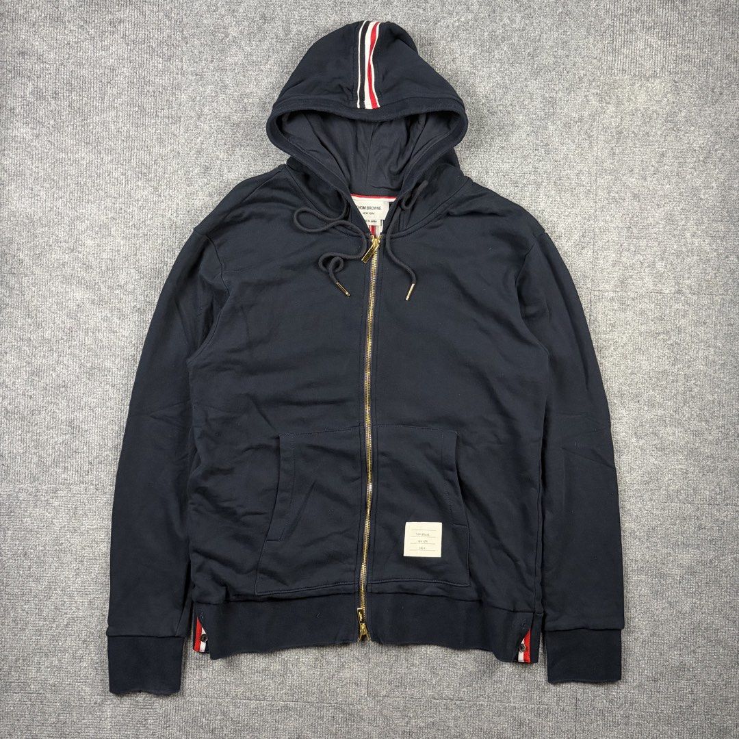 Thom Browne Loopback Center Back Stripe Zip-Up Hoodie (Category: Luxury Apparel) located in Manila. Submitted by yourtherapist_ (Listing ID 1464709218, Image 1). Description: Thom Browne Loopback Center Back Stripe Zip-Up Hoodie Size: 4 Condition: Excellent Made in: Japan Measurements Width: 21.5 Length: 28 Shoulder: 20 Sleeve: 26 .