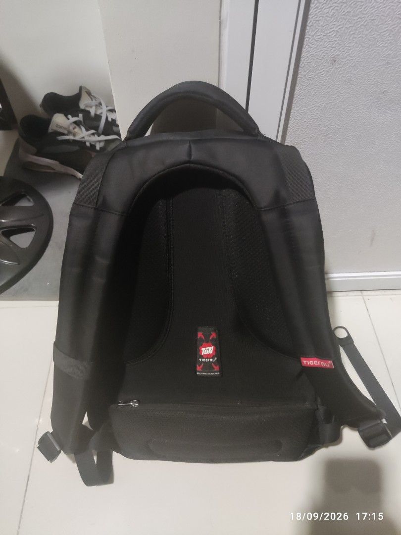 Tigernu Laptop Bag (Category: Laptop Bags & Sleeves) located in Manila. Submitted by mightydragon_92bcc7 (Listing ID 1464716545, Image 2). Description: Selling my 4-month Tigernu Laptop Backpack. No damages. RFS: Buying a bigger backpack. Bought Price: P1400.