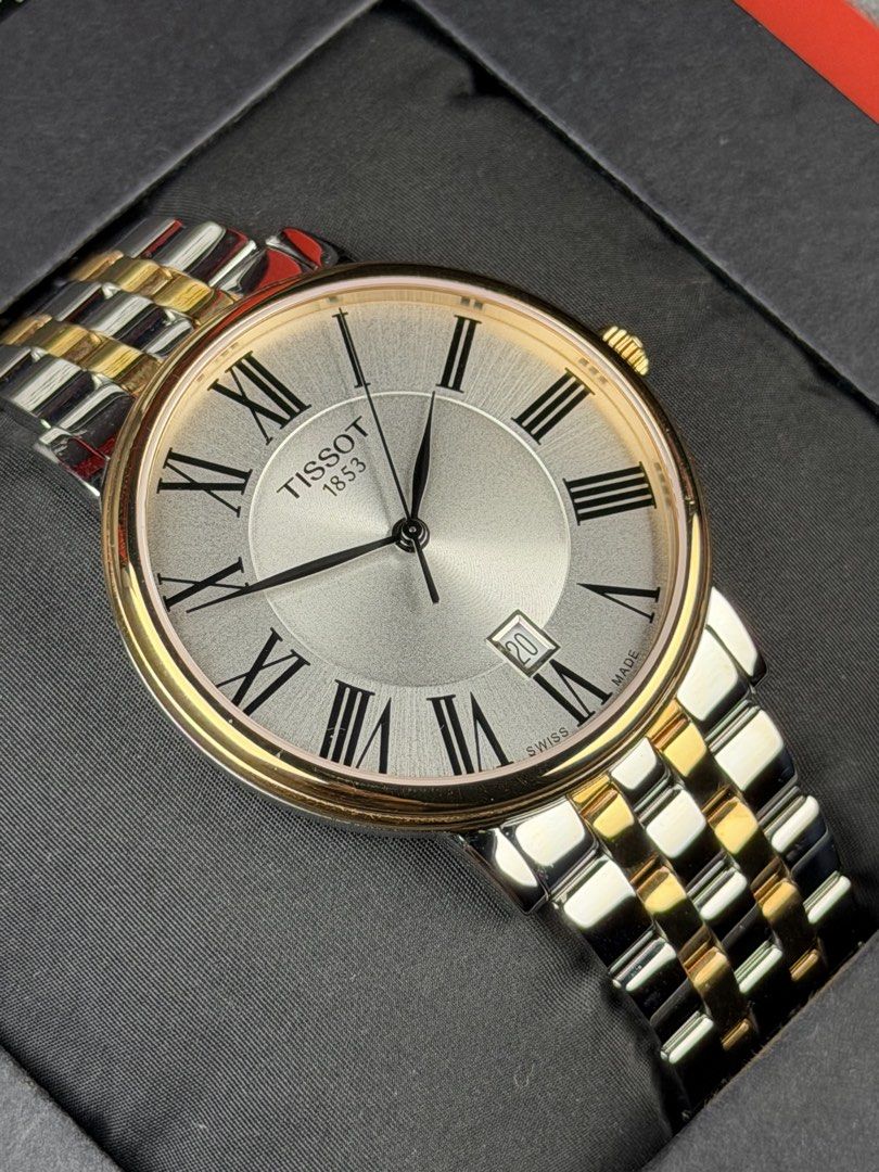 Tissot Carson Premium Two-Tone Rose Gold Silver Dial (Category: Men's Watches) located in Bacoor. Submitted by offtheclock (Listing ID 1464701401, Image 2). Description: Tissot Carson Premium Two-Tone Rose Gold Silver Dial Condition: Brandnew Reference No: T122.410.22.033.00 Movement: Swiss Quartz (ETA F06.115) Material: 316L Stainless Steel with Rose Gold PVD Coating Case Diameter: 40mm (Sapphire Crystal) Dial: Silver / Sunray Brush Finish Strap