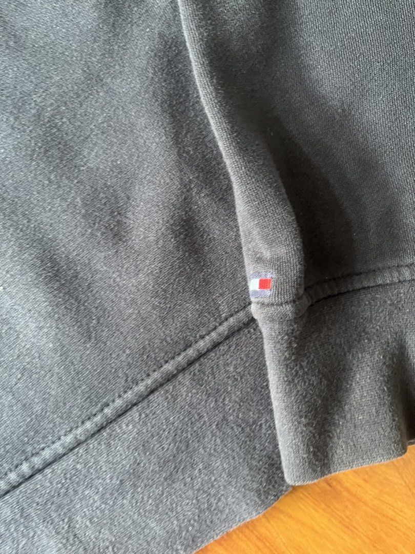 Tommy Hilfiger Big Logo "H" Quarter-Zip Pullover Sweatshirt (Category: Coats, Jackets and Outerwear) located in Lipa City. Submitted by alexcollectionco (Listing ID 1464723789, Image 2). Description: Classic navy Tommy Hilfiger 1/4 zip fleece pullover. Features a large embroidered “H” patch with red Hilfiger spellout on the chest, small signature flag logo tab near the bottom cuff, heavy metal zipper hardware, and a comfortable ribbed hem and cuf